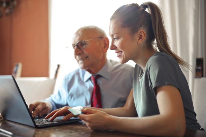Man And Woman At Computer